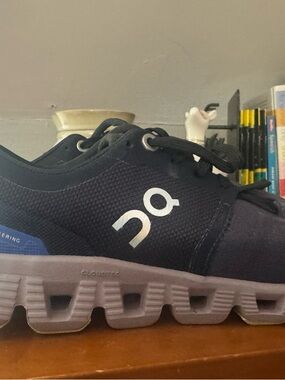 On Running Black Athletic Shoe with White Logo